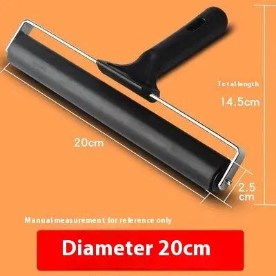 Black rubber paint roller tool with metal bracket, 6cm wide, for wall painting.