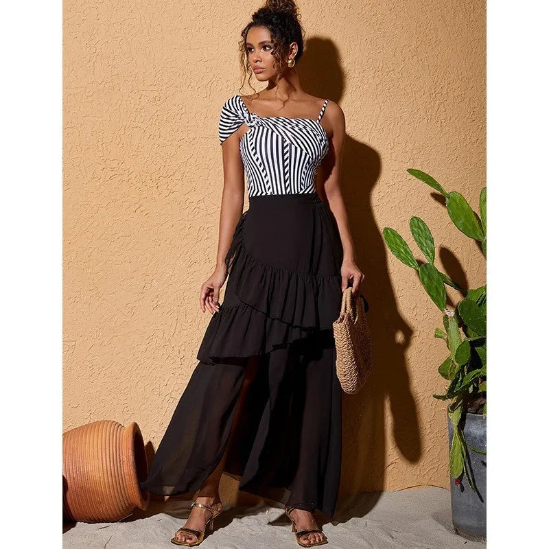 Women's one-piece swimsuit with ruffled striped design and attached skirt in polyester fabric