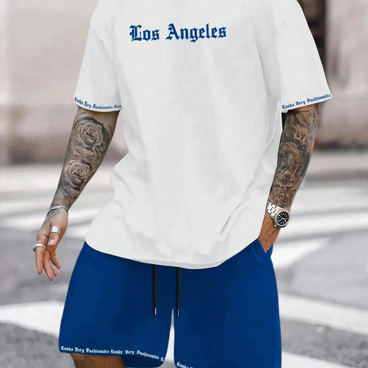 Sports style short-sleeved top and shorts set in polyester blend fabric, available in multiple colours and sizes