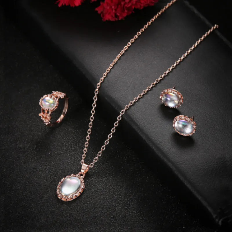 Women's alloy pendant necklace set with electroplated finish, inlaid gems, earrings, and hand accessories