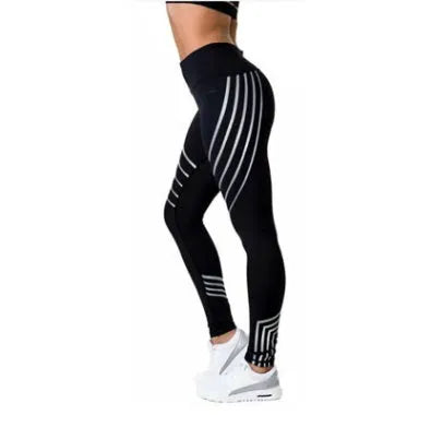 Women's glow-in-the-dark workout leggings in black with printed pattern, slim fit pencil pants length