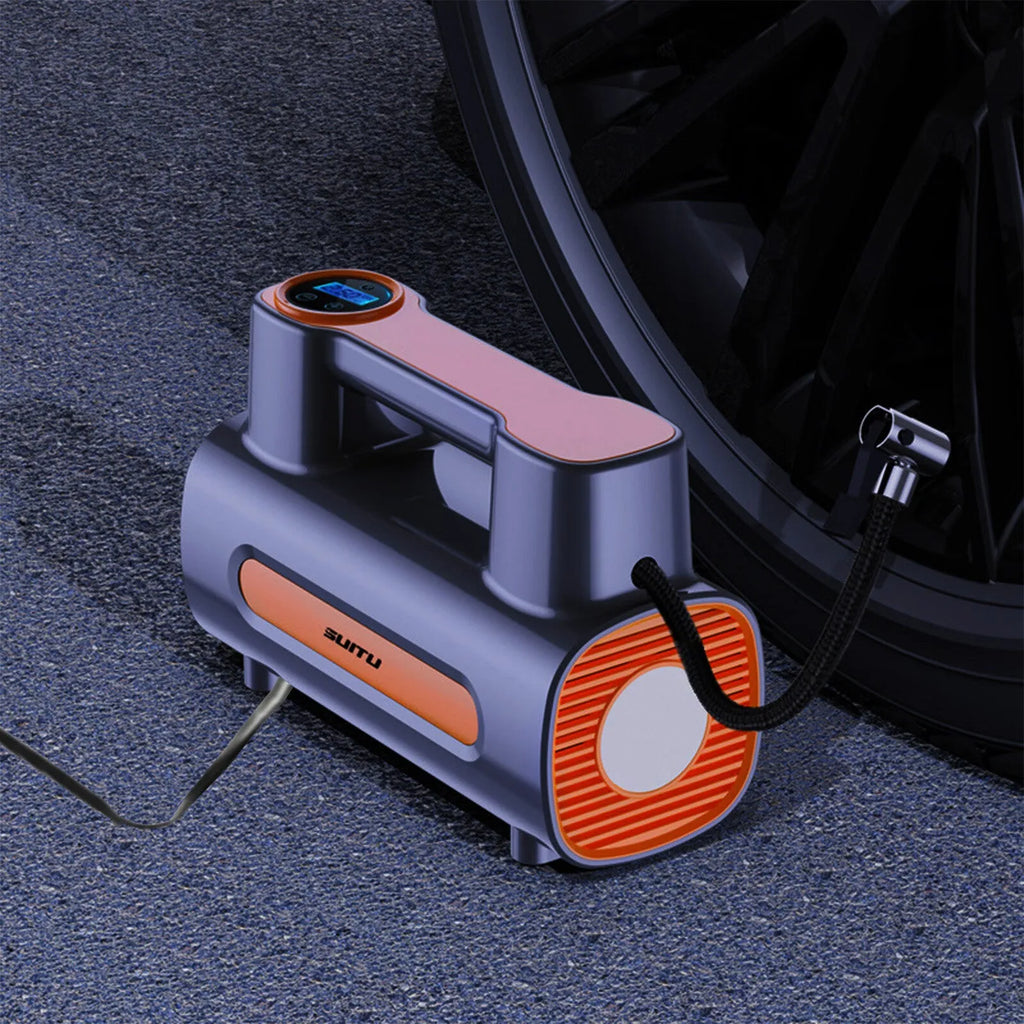 Black portable tyre inflator with digital LCD screen, USB charging port, and built-in battery.
