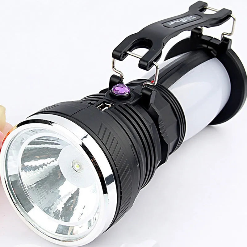 Black solar charging LED flashlight with USB port and press switch for outdoor emergency use