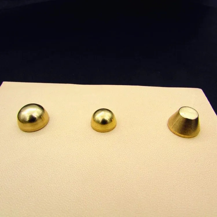Brass decorative buckle for footwear showing 10x6mm and 12x7mm sizes in round and geometric shapes