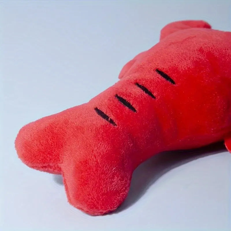 Red squeaky lobster stuffed dog toy measuring 12.5cm with detailed appendages