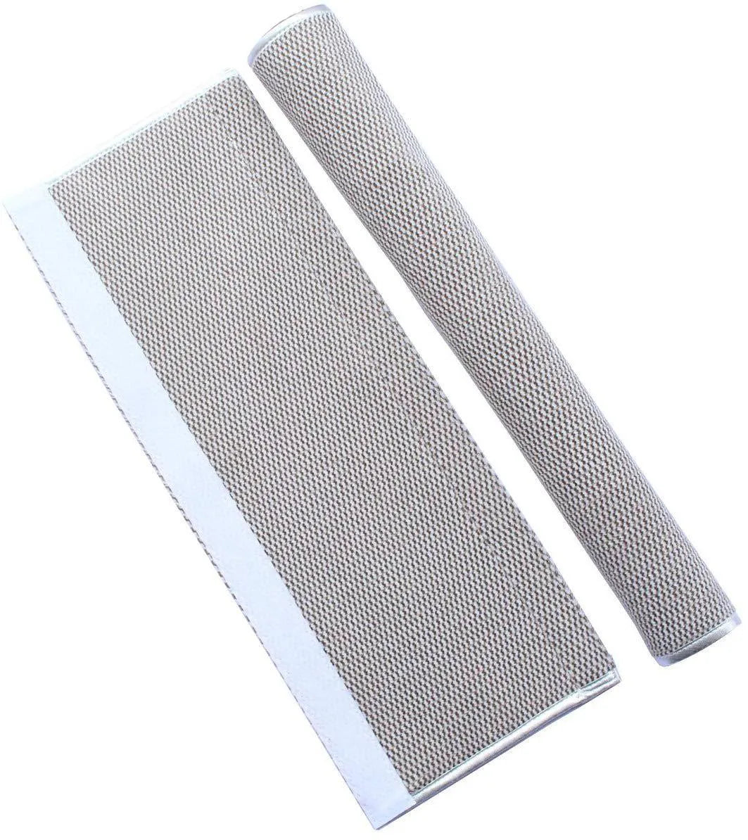 Grey solar-powered outdoor wall light mounted on a fence, showing its rectangular shape and solar panel.