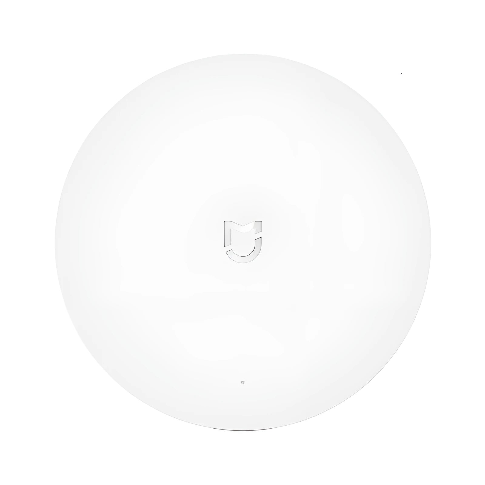 White circular smart home gateway with UK plug for wireless device control