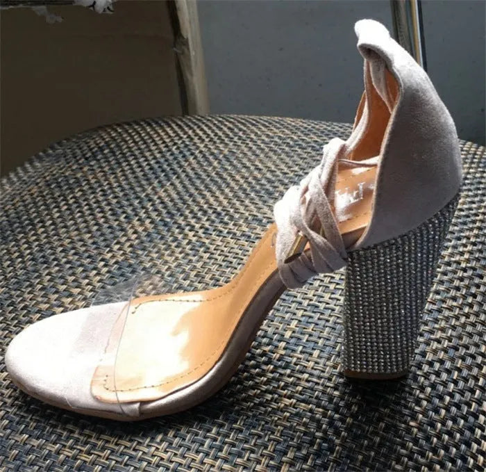 Black and gold pointed-toe high heels with plastic construction, shown in sizes 36-41