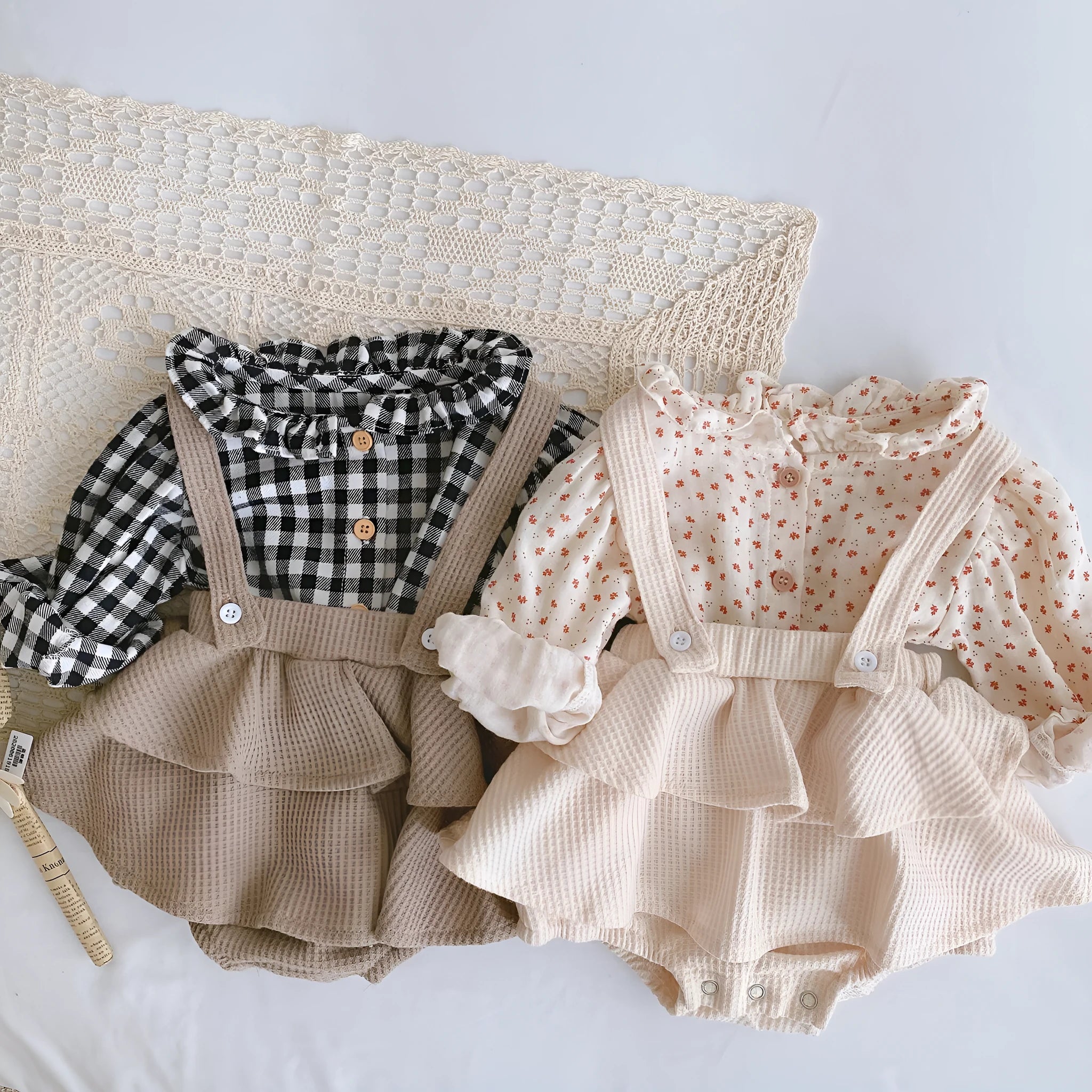 Baby romper with triangle climb sling design and pleated lotus leaf detail for 0-2 year olds