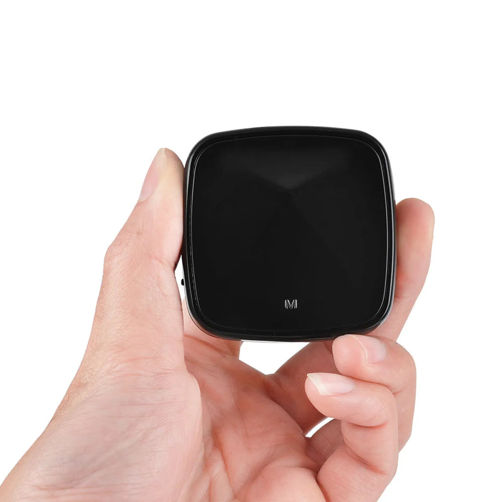 Black square Bluetooth 5.0 audio adapter with optical and AUX ports for wireless music streaming.