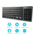 Thin white Bluetooth keyboard with 104 keys beside iPad showing wireless connectivity