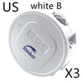 USB ocean star galaxy projection night light with voice control and rotation on a table.