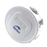USB ocean star galaxy projection night light with voice control and rotation on a table.