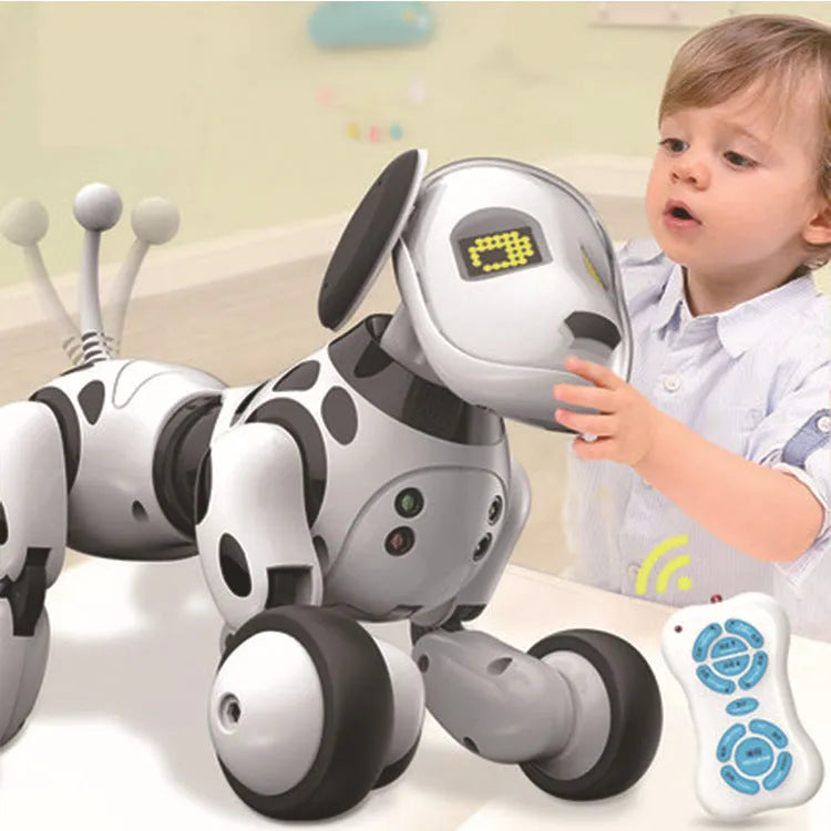 Smart robot dog toy with remote control on a table.