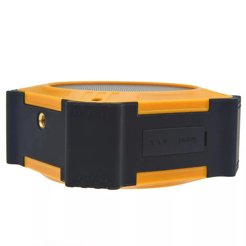 Black waterproof portable Bluetooth speaker showing compact 101x101x47mm dimensions with wrist strap attached