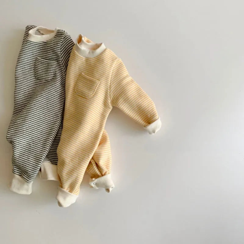 Striped cotton fleece baby jumpsuit with long sleeves and hidden buttons, shown in yellow and black.