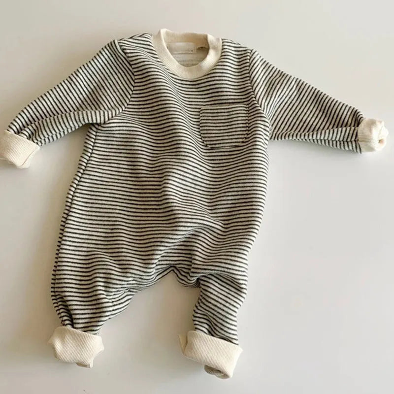 Striped cotton fleece baby jumpsuit with long sleeves and hidden buttons, shown in yellow and black.