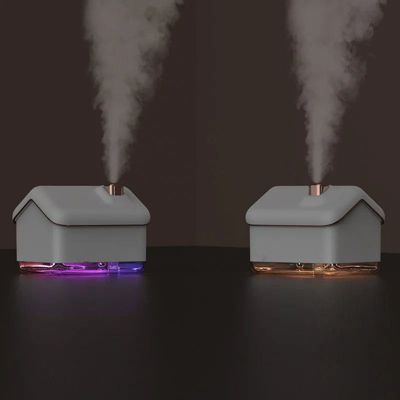White igloo-shaped ultrasonic humidifier with 300ml tank and LED light on wooden surface