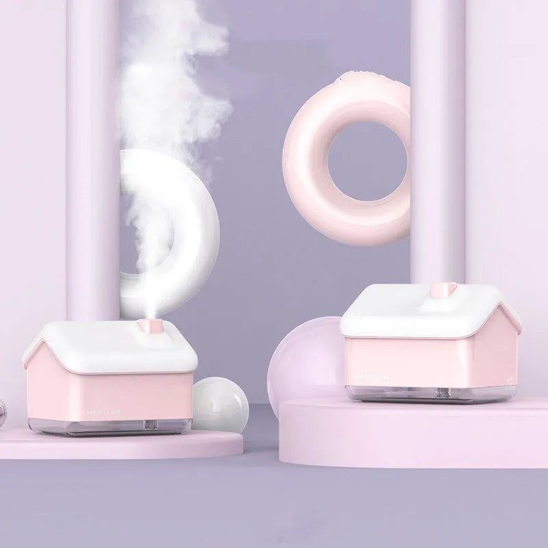 White igloo-shaped ultrasonic humidifier with 300ml tank and LED light on wooden surface