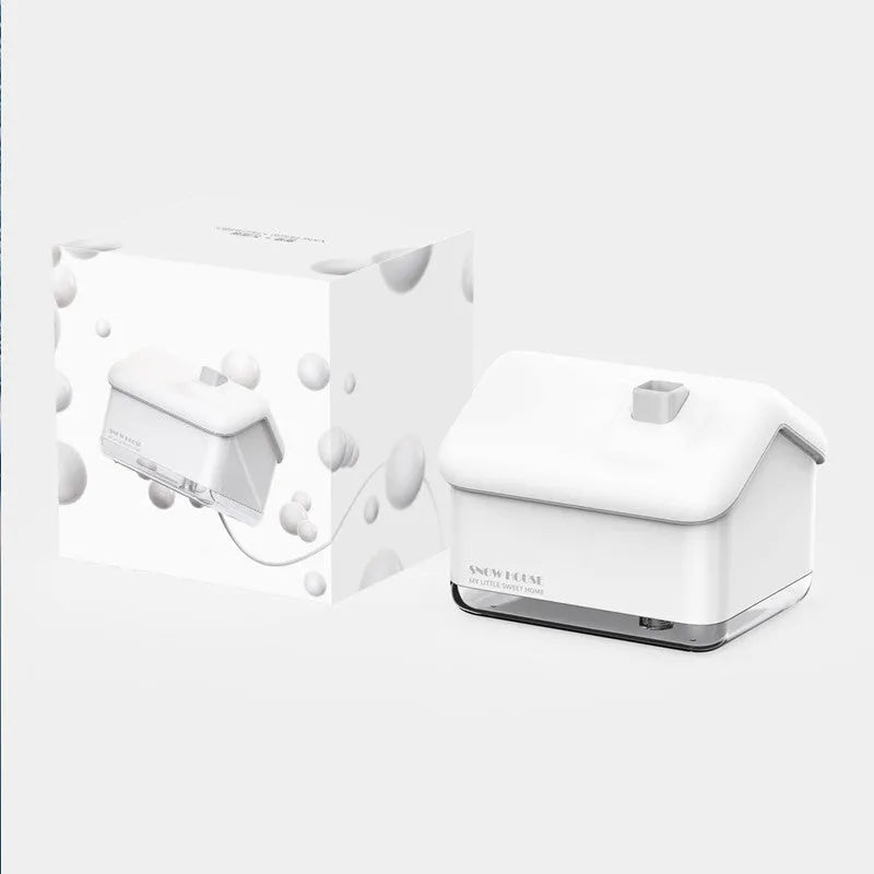 White igloo-shaped ultrasonic humidifier with 300ml tank and LED light on wooden surface