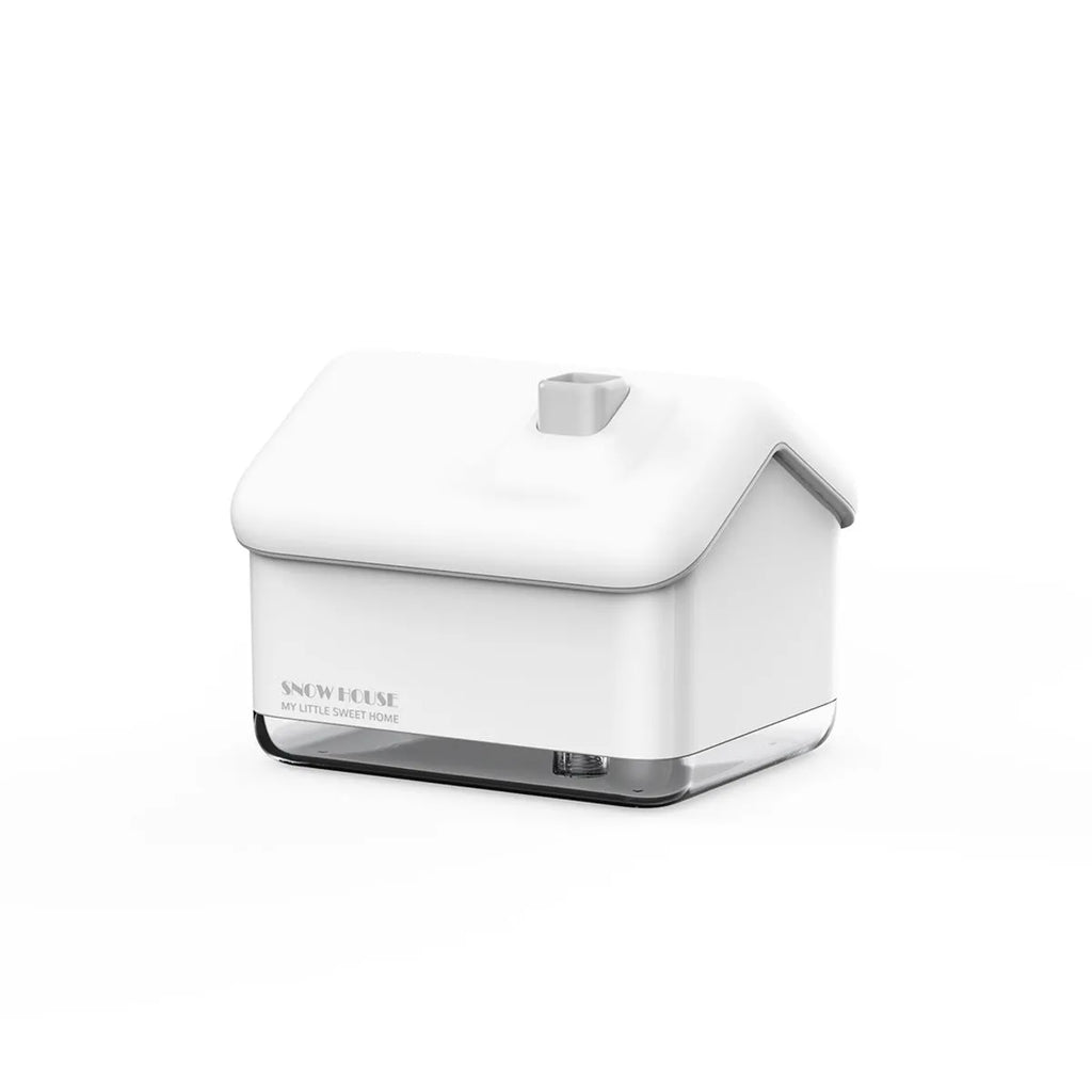White igloo-shaped ultrasonic humidifier with 300ml tank and LED light on wooden surface