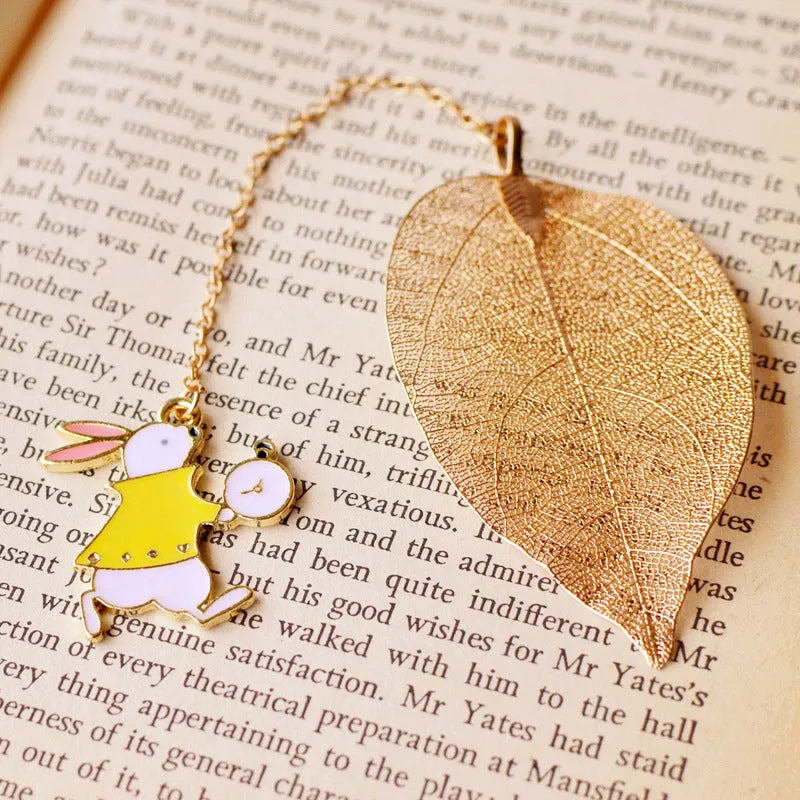Alice in Wonderland themed metal bookmark with leaf shape and character charm options