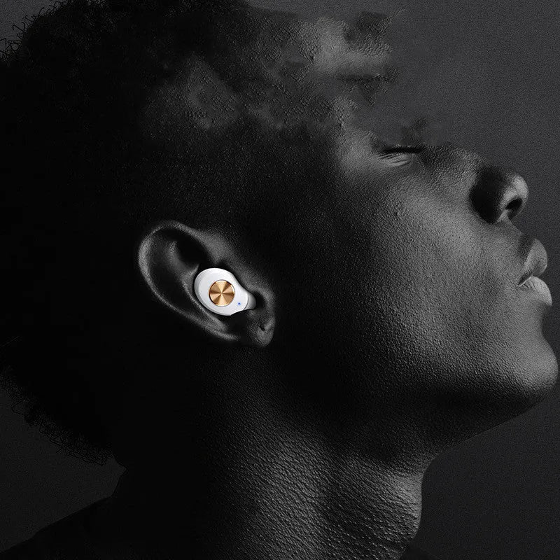 Wireless Bluetooth Mini TWS Binaural Headphones Pebble Series in black, showing earbuds and charging compartment