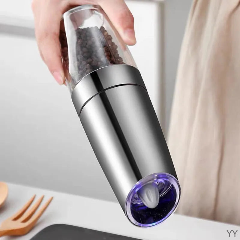 Electric gravity pepper grinder in matte black or silver with adjustable coarseness knob and acrylic bottle