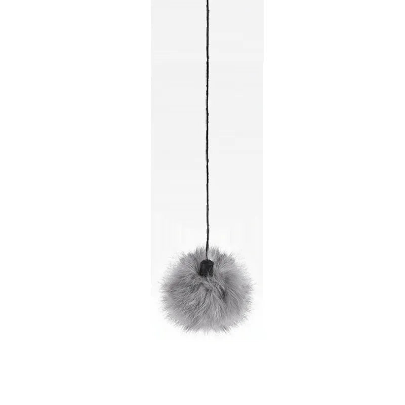 White electric interactive cat toy with 7cm ball and rope plus real fur ball accessory for indoor cats