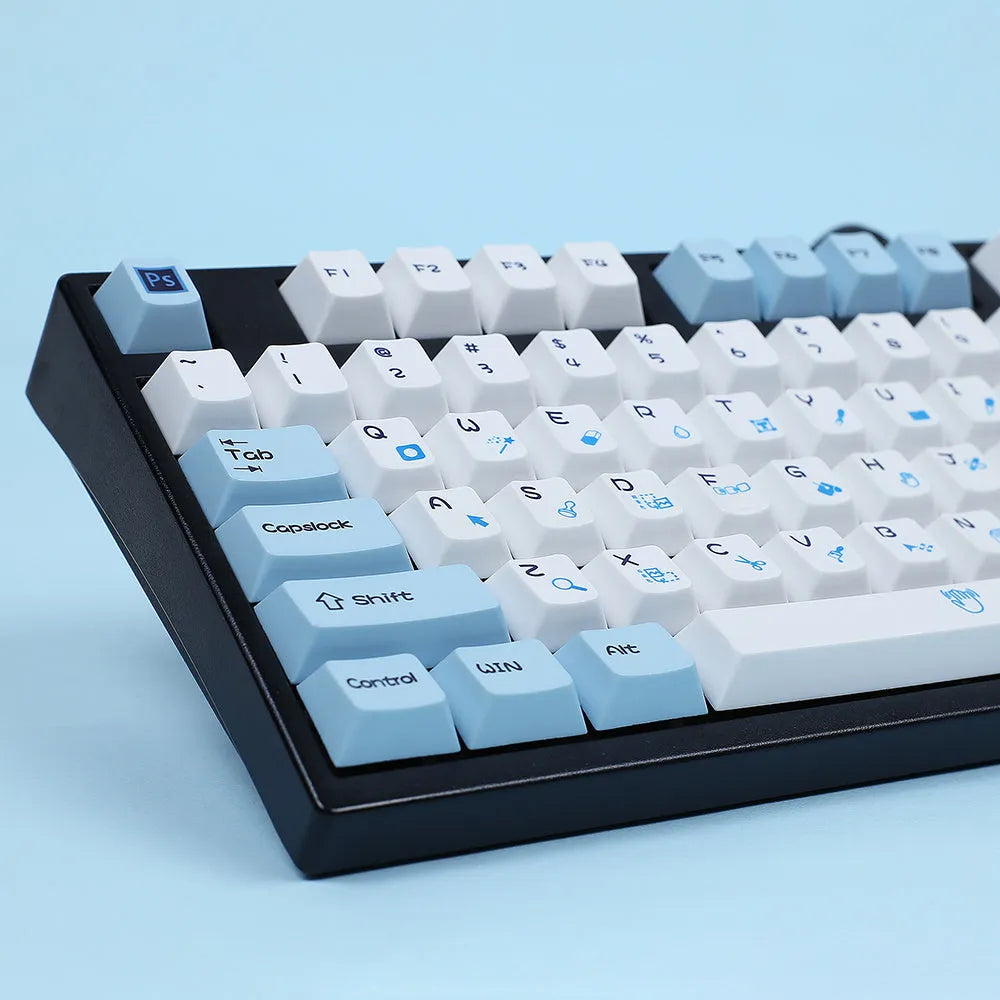 PS theme mechanical keyboard keycap set showing blue and white design with supplementary RGBK coloured keys