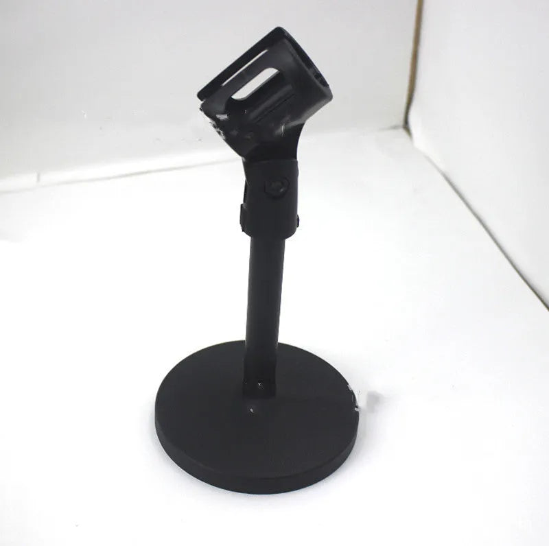 Black metal desktop microphone stand with a plastic clip on a 10.5cm base.