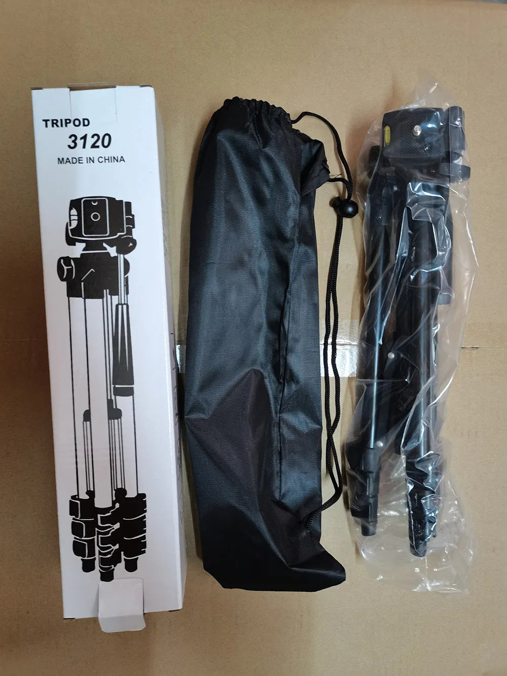Black aluminium alloy camera tripod with 3D head extended to 102cm height, showing quick-release plate