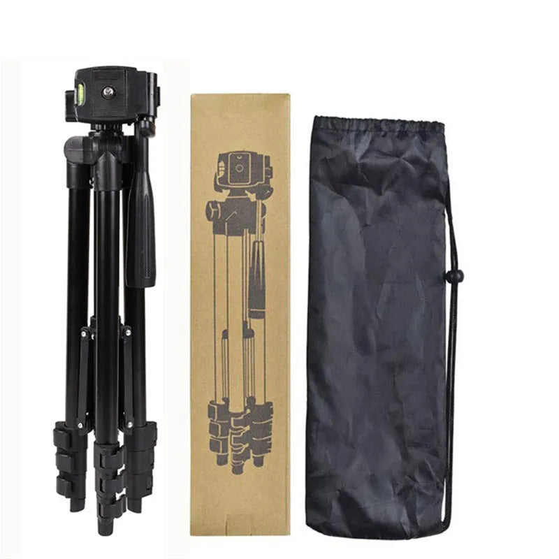 Black aluminium alloy camera tripod with 3D head extended to 102cm height, showing quick-release plate