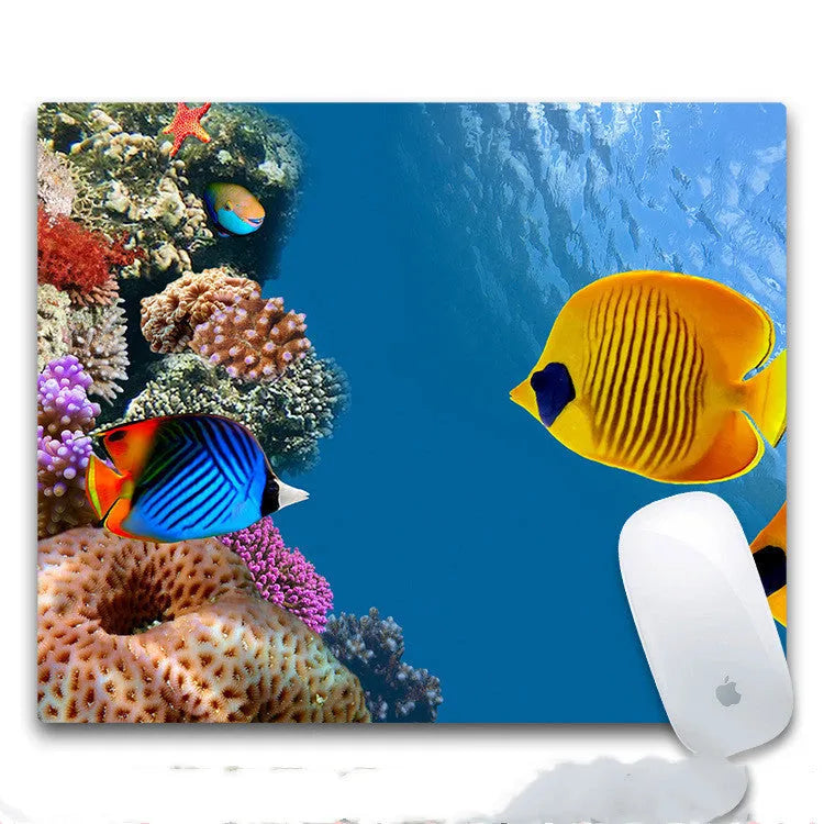 Custom printed rubber mouse pad with cloth surface, showing one of eight available design options.
