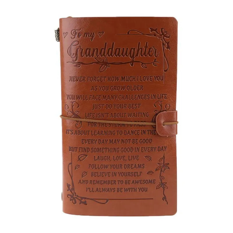 Brown leather strap-bound notebook with warm brown acid-free paper pages, shown closed.