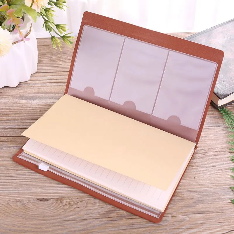 Brown leather strap-bound notebook with warm brown acid-free paper pages, shown closed.