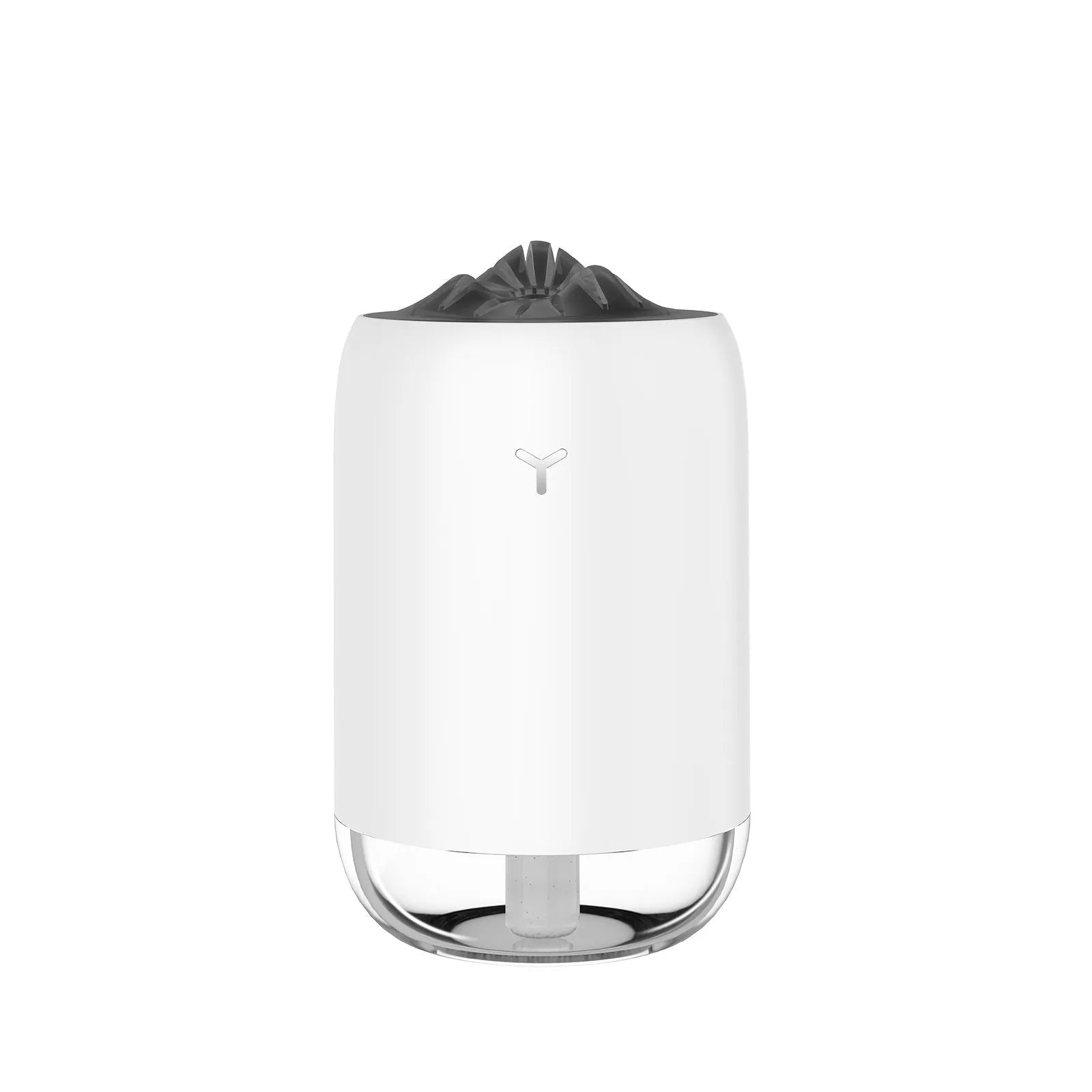 White columnar magic flame humidifier and aroma diffuser on a desktop with mist and coloured light effect.