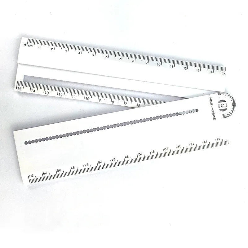 White 30cm plastic multi-function ruler with straight edge and angle measurement scales.