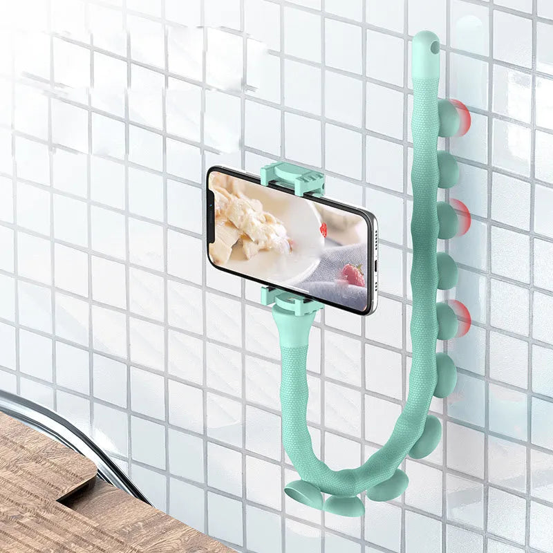 Black flexible phone holder with 62cm gooseneck arm and silicone bracket on a desktop