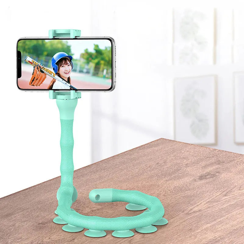 Black flexible phone holder with 62cm gooseneck arm and silicone bracket on a desktop