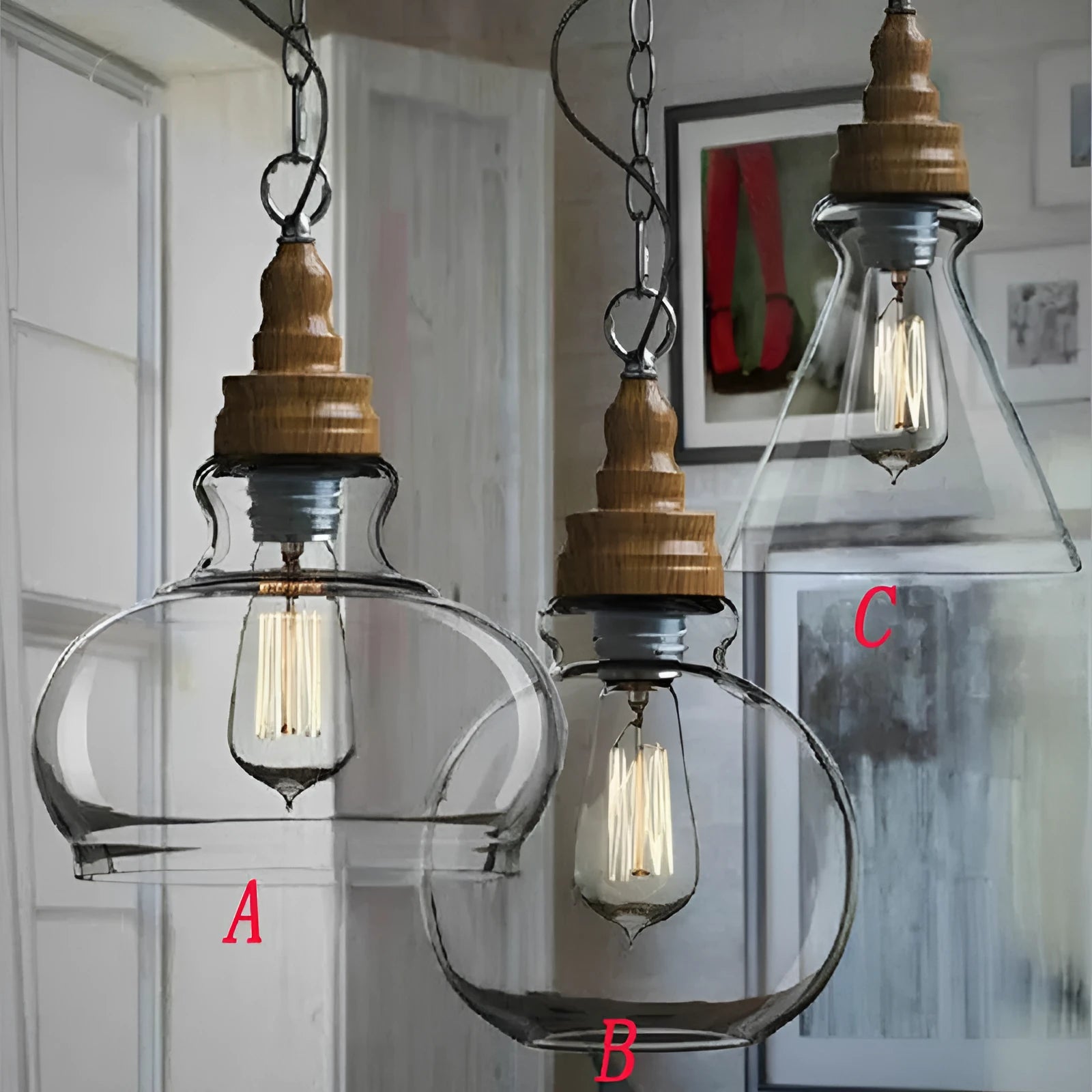 Single head glass pendant light with wood grain finish hanging from ceiling on adjustable cable.