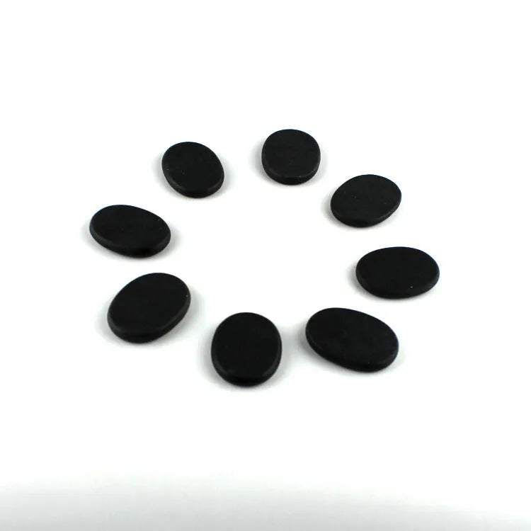 Black energy stone massage heater with constant temperature heating box and 16 volcanic stones for tuina and relaxation.
