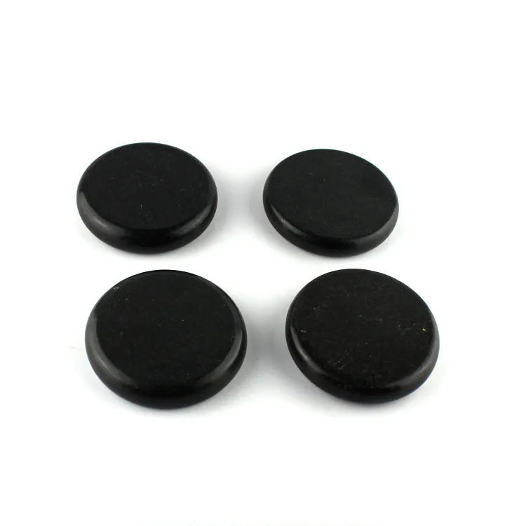 Black energy stone massage heater with constant temperature heating box and 16 volcanic stones for tuina and relaxation.