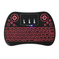 Compact wireless keyboard with seven-colour backlight showing English layout and USB dongle