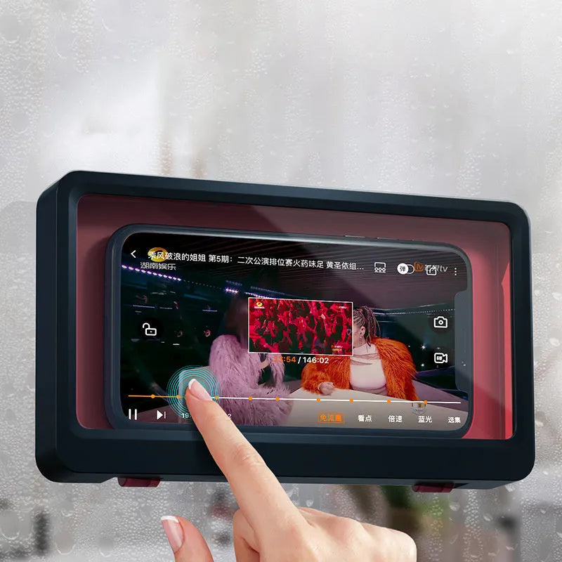 Waterproof bathroom phone holder mounted on wall with mobile device inserted, showing non-marking sticker installation