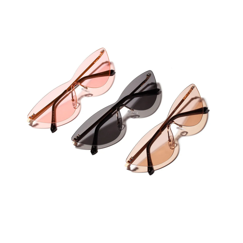 Brown tinted vintage sunglasses with metal frame and UV400 protection for adult use