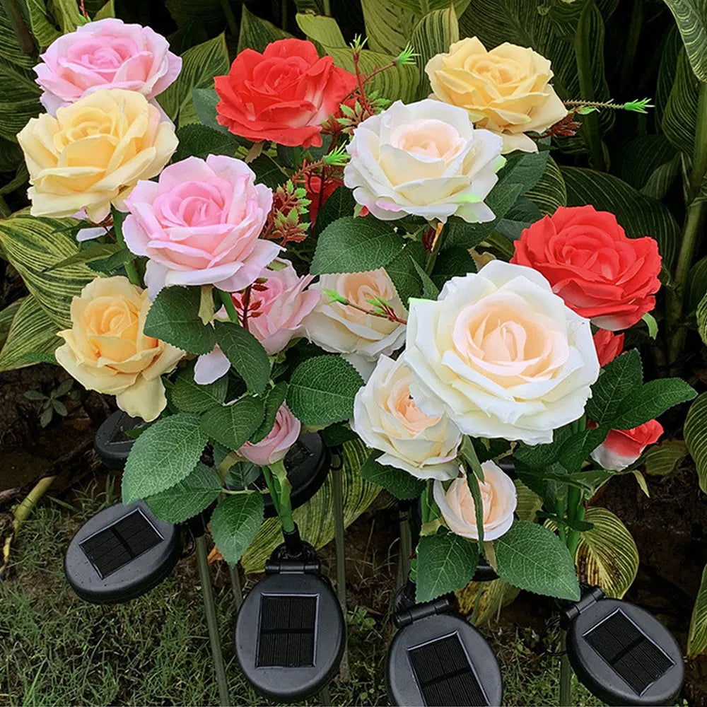 Outdoor solar garden light with three decorative rose heads on 80cm ground stake