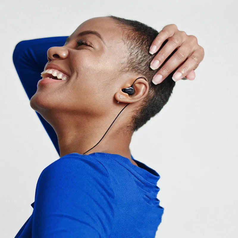 White in-ear sports headphones with around-ear design and 3.5mm plug for mobile phones