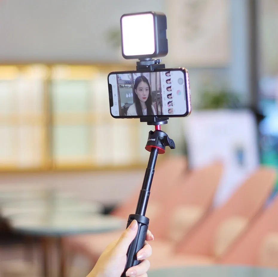 Combo 8 mobile phone vlog filming bracket with integrated phone stand and fill light mount.
