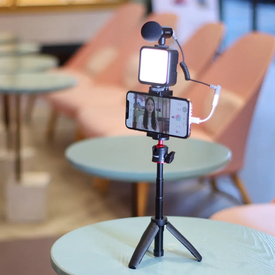 Combo 8 mobile phone vlog filming bracket with integrated phone stand and fill light mount.